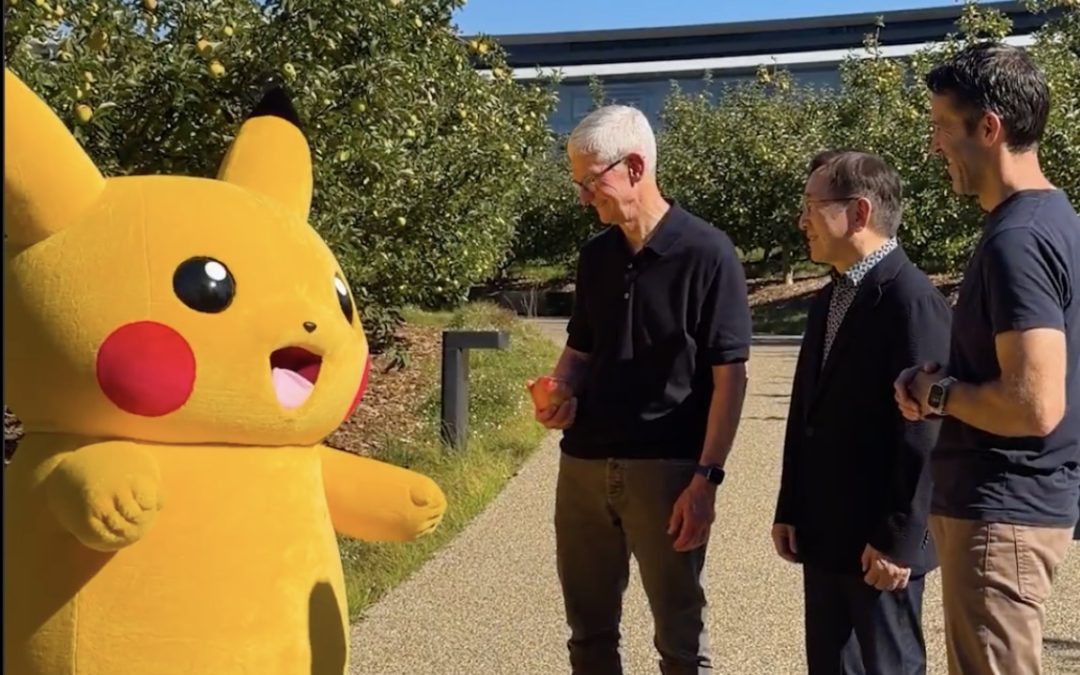 Current Apple CEO Tim Cook introduces upcoming Apple CEO to Pikachu