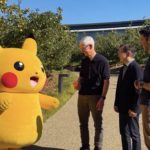 Current Apple CEO Tim Cook introduces upcoming Apple CEO to Pikachu